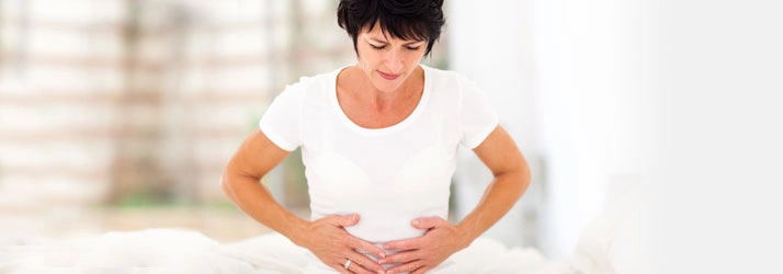 Chiropractic Ventura CA Woman Holding Stomach Gut Health