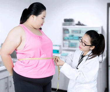 Chiropractic Ventura CA Woman Measuring Weight Loss